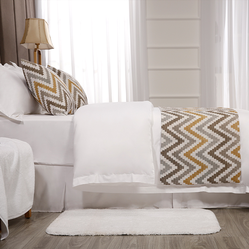 Wavy textured bed end towel